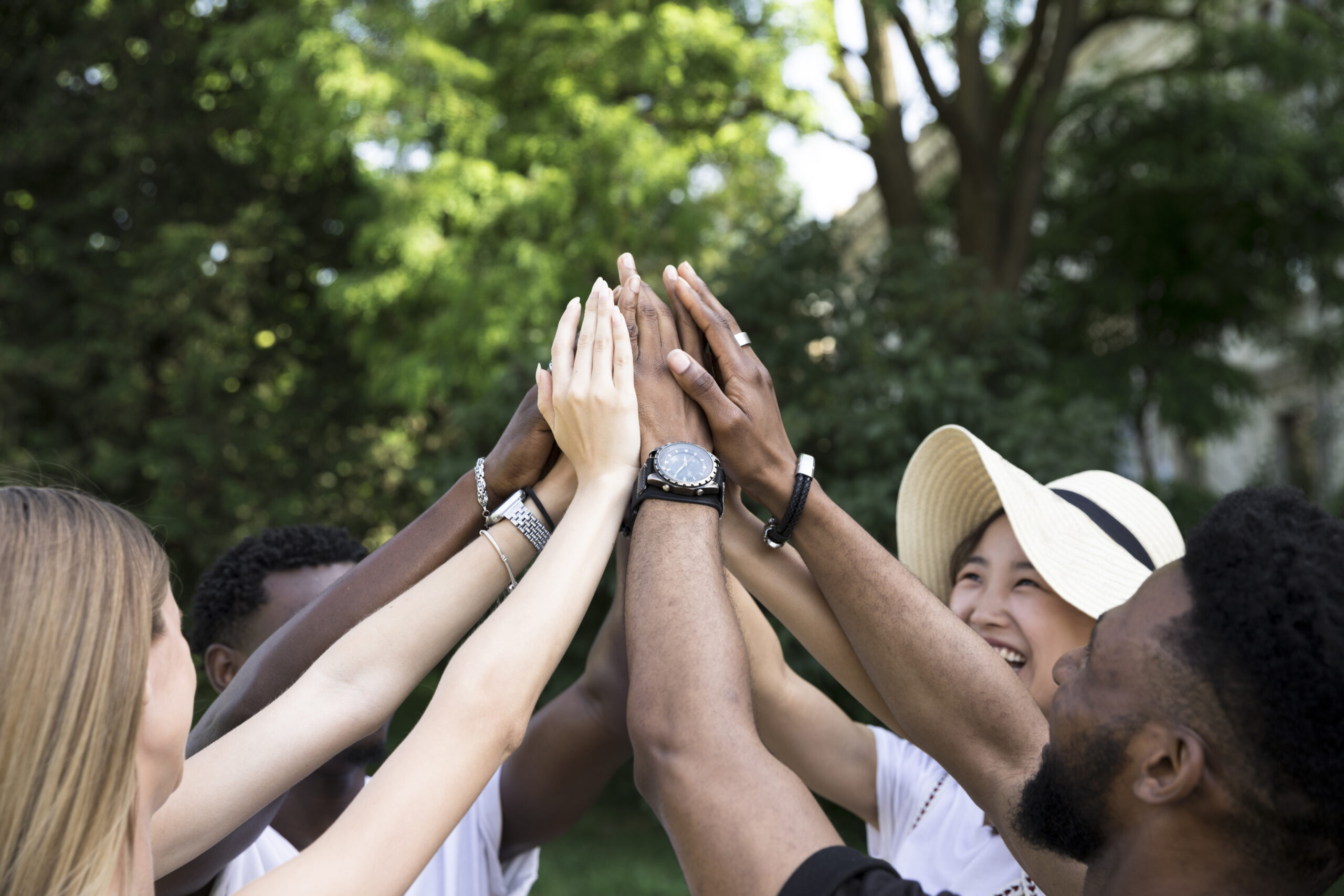 front-view-interracial-friends-cheering